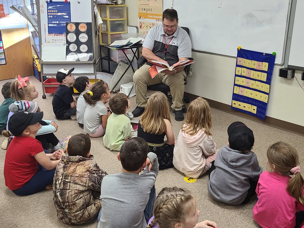 Mr. H reads to kindergarten
